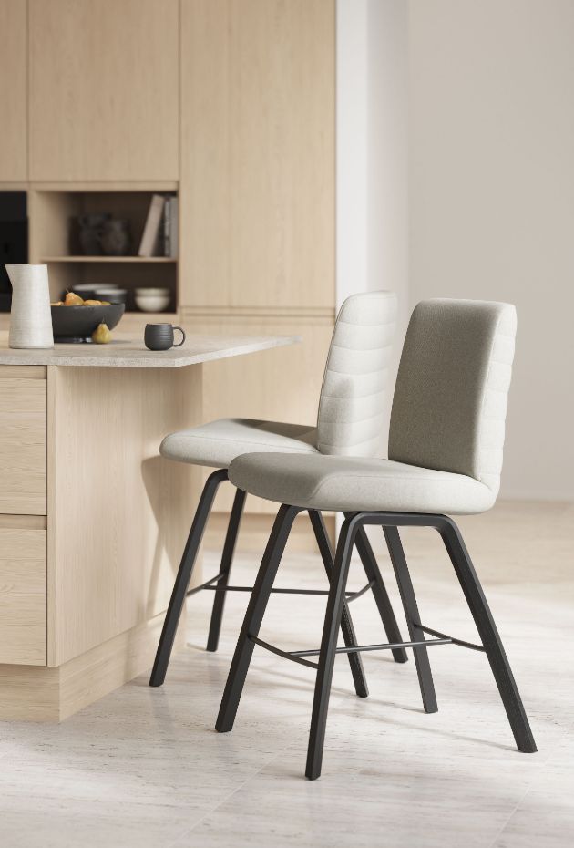 H2 Seating upholstered dining stools at a kitchen island